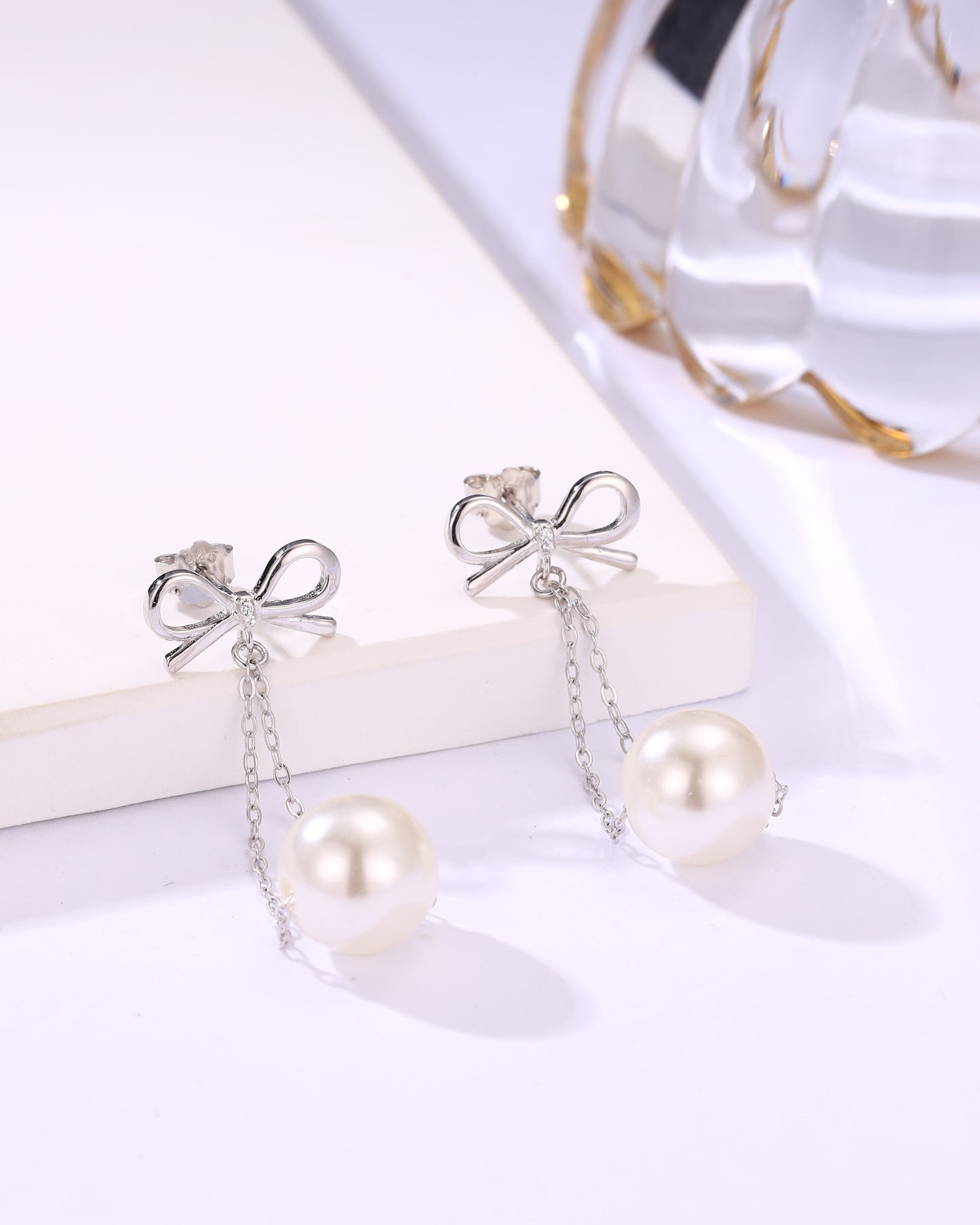 Bow Chain Pearl Drop Earrings – Elegant Silver Pearl Dangler for Women